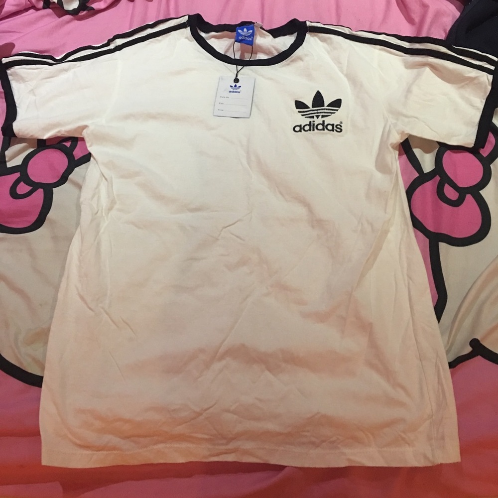 NWT . size L but can fit size M